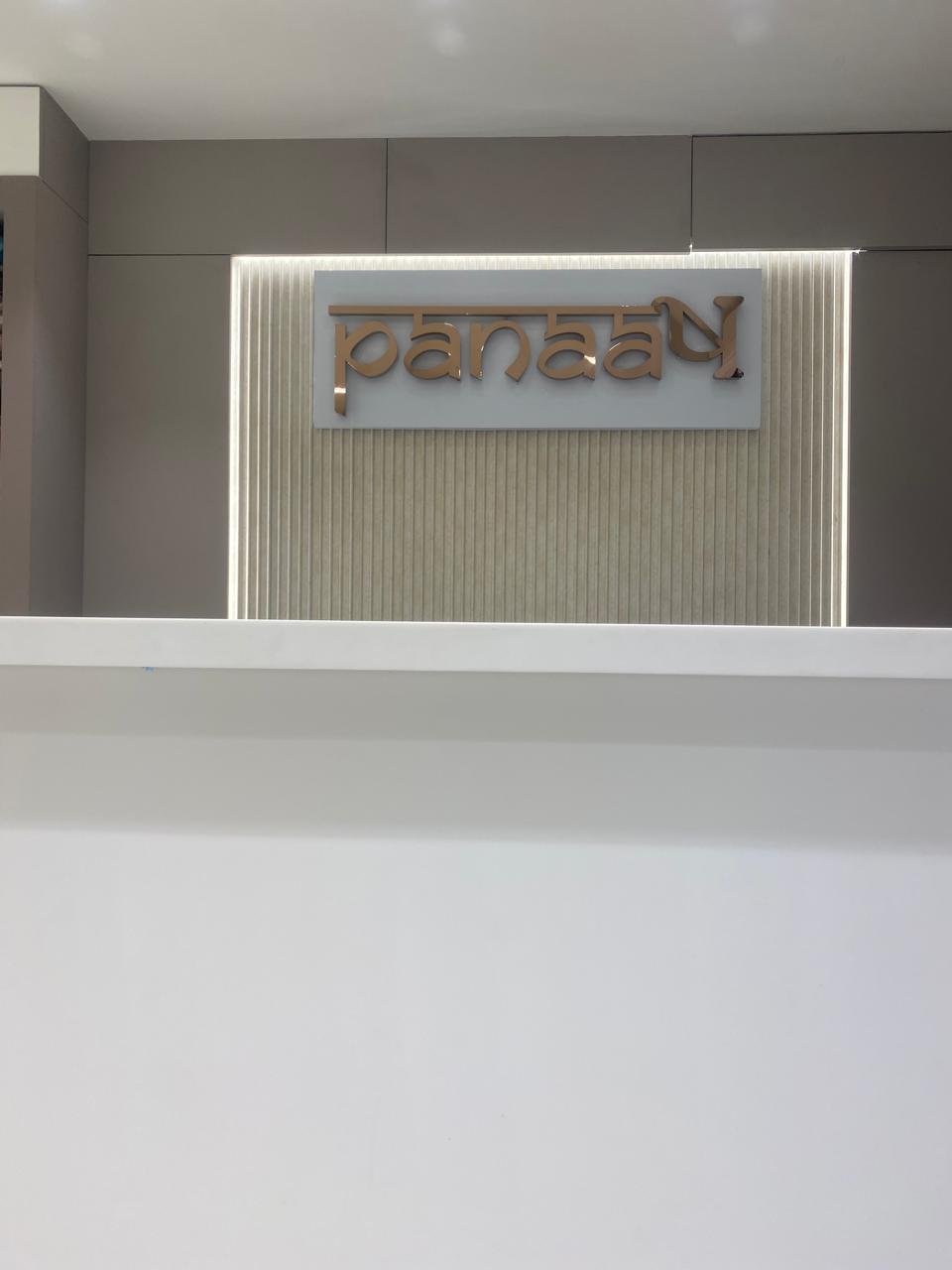 Panaash Reception - Elegant store entrance with illuminated logo